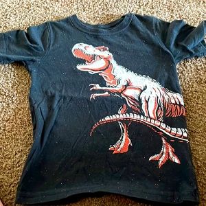 Black shirt with orange and white dinosaur jumping beans shirt size 5
